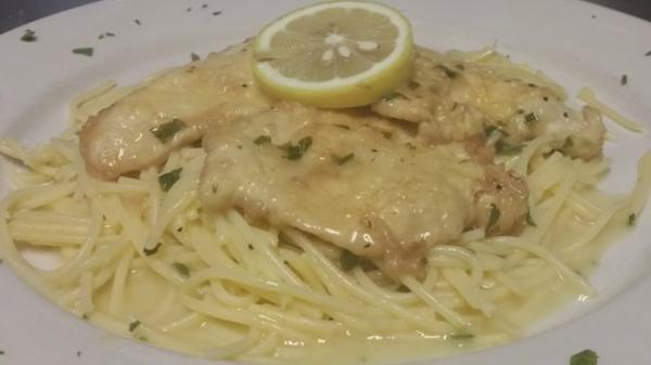 Chicken Francese Dinner · Served over pasta, over rice or potato and vegetable with choice of soup or salad and garlic bread.