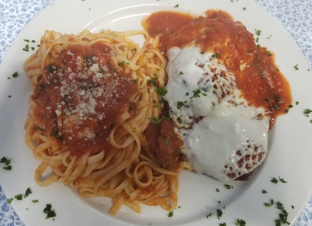 Chicken Parmigiana Dinner · Served over pasta, over rice or potato and vegetable with choice of soup or salad and garlic bread.