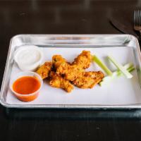 1 Dozen Buffalo Wings · Cooked wing of a chicken coated in sauce or seasoning.