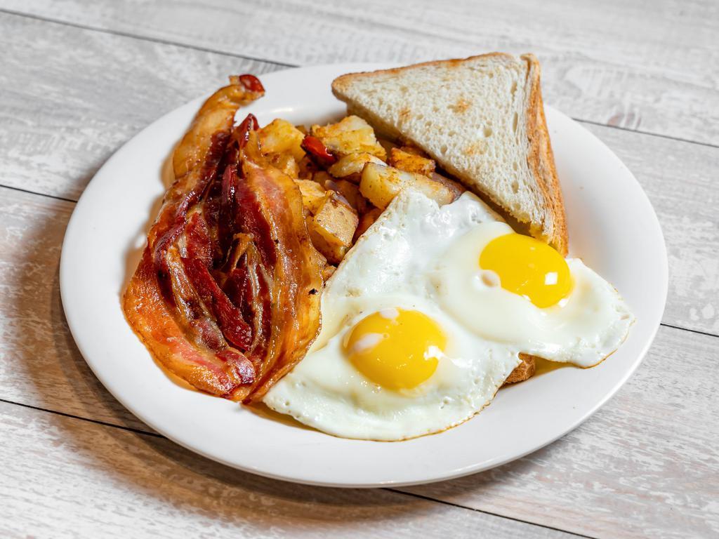 2 Eggs Platter Any Style · Served with potatoes and toast.