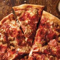 All Meat Pizza · Classic pepperoni, ham, Italian sausage, bacon, sauce and three cheese blend.