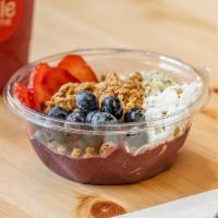 Berry Acai Bowl · Blueberries, acai, banana, spinach, coconut water, dates topped with granola, blueberries, s...