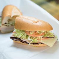 Pepper Turkey Sandwich · Served with cheese, lettuce, tomato, onion and oil and vinegar.