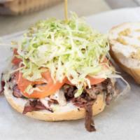 Pastrami Sandwich · Served with cheese, lettuce, tomato, onion and oil and vinegar.