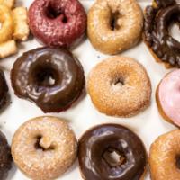 Assorted Dozen Mixed Cake Donuts · A combination of plain, vanilla, choco, double choco, blueberry,  and red velvet cakes and b...