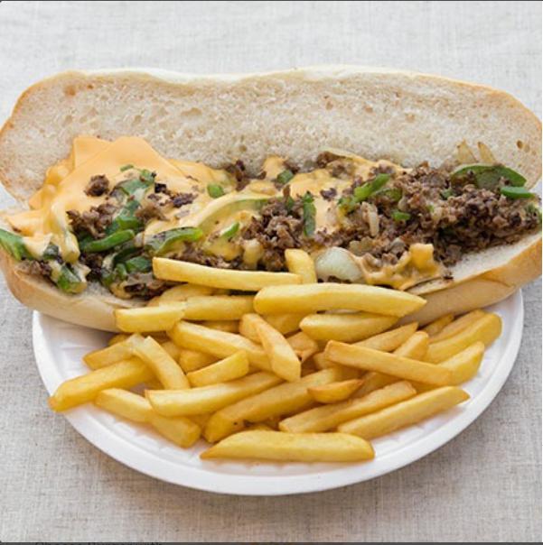 Philly Cheesesteak Sandwich with french fries · Toasted hero bread with chopped green peppers, onions, steak and your choice of cheese. Comes with fries.
