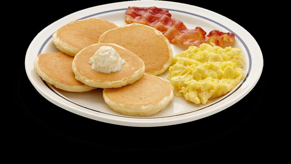 Pancake with 2 Eggs Any Style with Meat · 3 pancakes served with two eggs any style and meat of your choice from ham, bacon or sausage 