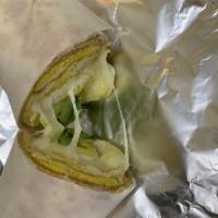Avocado Breakfast Burrito · 3 scrambled eggs, shredded cheese and fresh avocado