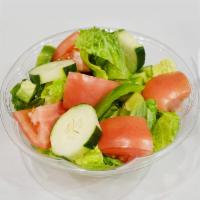 Garden Salad · Fresh  lettuce, chunks of tomatoes, cucumber, green and carrots. Served with choice of dress...