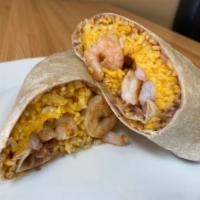 Shrimp Burrito · Yellow rice, refried beans, cheese, grilled shrimp stuffed in a flour tortilla.