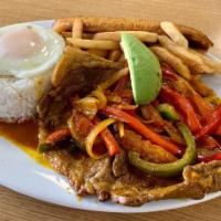 Steak au Jus · Sirloin cut of steak with peppers, onions, rice, fries, avocado, sweet plantain, and a fried...