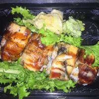 Honey Roll · Spicy tuna inside and toasted eel on top with special honey sauce.