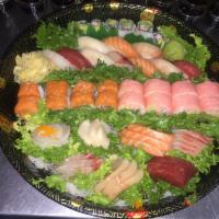 Love Boat Dinner · 1 yummy roll, 1 x'mas roll, 10 pieces of sushi, 21 pieces sashimi and 1 California roll. Ser...