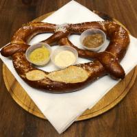 Hot Giant Pretzel · Giant pretzel served with 2 mustards and a horseradish sauce.