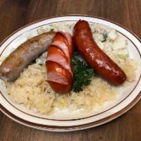 3 Sausage entree · Bratwurst, Knockwurst and Krainerwurst. served with potato salad and sauerkraut