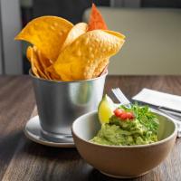 Guacamole, Chips · A creamy dip made from avocado, cilantro, onion, serrano pepper, lime and salt