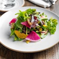 Ensalada mixta · Organic salad greens, cucumber, red onion, orange, citrus vinaigrette
