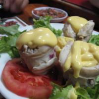 Locos con Mayo · Chilean abalone and boiled potatoes, served on a bed of lettuce and served with homemade gre...