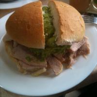 Lomite Palto Sandwich · A sandwich with thinly sliced pork meat and avocado in a freshly baked bun. Includes papas f...