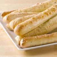 Bread Sticks · Fresh, oven baked dough. Served with dipping sauce.