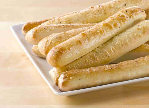 Breadsticks · Fresh dough baked to a golden brown. Served with pizza sauce for dipping.topped with special garlic sauce and parmesan cheese.