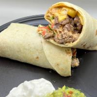California Carne Asada Burrito · Our seasoned, grilled steak with fries, chipotle sauce, Jack cheese and pico.