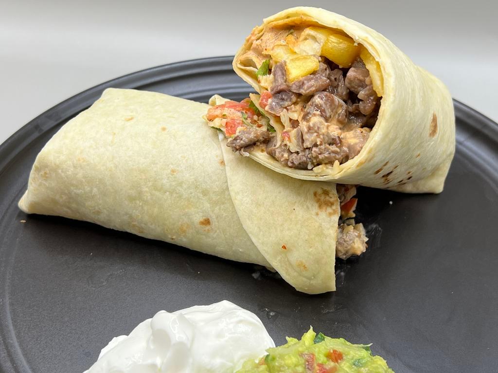 California Carne Asada Burrito · Our seasoned, grilled steak with fries, chipotle sauce, Jack cheese and pico.