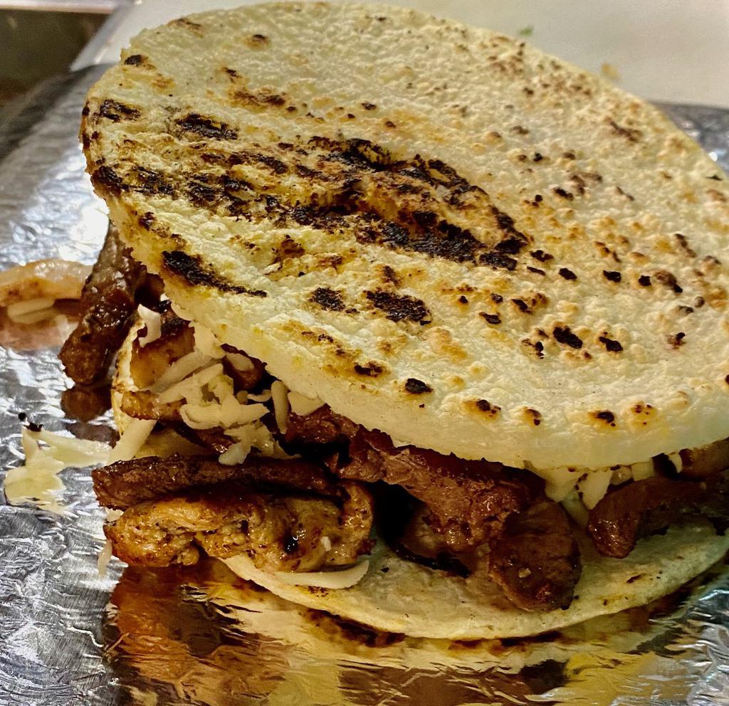 Arepa Con Todo · FILLED WITH CHICKEN, STEAK, CHORIZO, PORK BELLY, LETTUCE, AND OUR HOUSE SAUCES