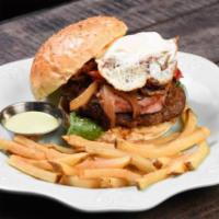 D'Antigua Burger Combo · ITS INDULGENT AND JUICY,   BACON CHEESEBURGER TOPPED WITH A FRIED EGG, LOADED WITH HAM, MUSH...