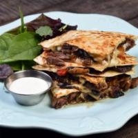 Carne Quesadilla (STEAK) · PERFECT SAVORY MEAL ZESTY, SEASONED STEAK STRIPS GRILLED WITH ONIONS, PEPPERS AND LOTS OF CH...