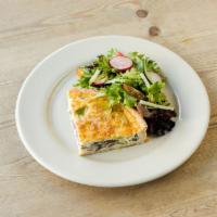 Mushroom Quiche · buttery crust filled with savory custard,
mushrooms, and Gruyère