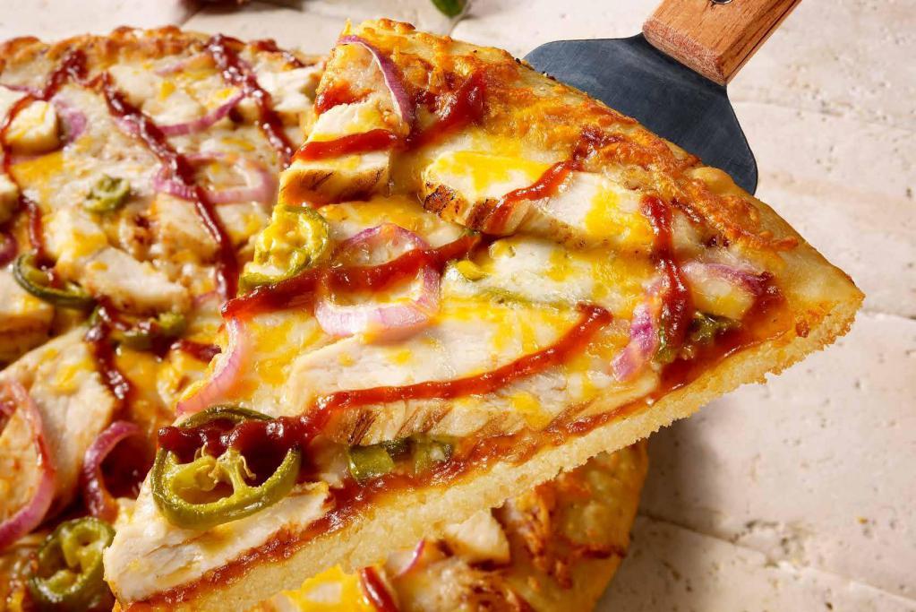 BBQ Chicken & Jalapeno Pizza · Chicken, 2 cheeses, BBQ sauce, onion, pickled jalapeños.