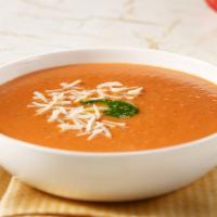 Tomato Basil Soup · It’s Italian for awesome. A creamy blend of tomato, basil and onion. Topped with basil pesto...