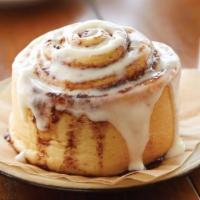 Cinnabon® Classic Roll · Warm dough and legendary Makara® cinnamon, topped with rich cream cheese frosting. 880 cal.