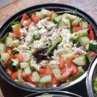 Feta · Spring mix, cucumber, tomato, red onion, Kalamata olive, feta, and housemade Greek vinaigret...