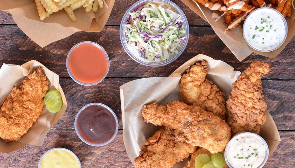 18 Tendies Tenders Party Box · Party size box of Tendies’ famous jumbo, buttermilk herb marinated, double hand-breaded chicken tenders, pickles, fries, coleslaw,  and your choice of sauces and seasonings. Feeds 6-8 people.