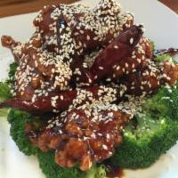 153. Sesame Chicken  · Dark meat. Served with broccoli on the side. Spicy.