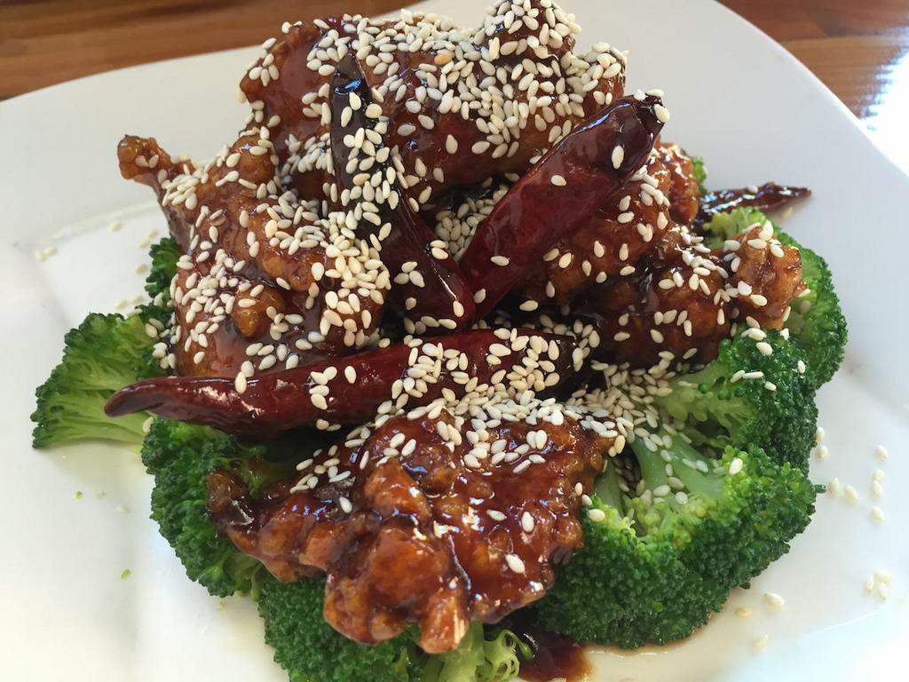 153. Sesame Chicken  · Dark meat. Served with broccoli on the side. Spicy.