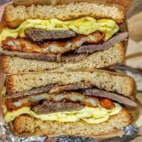 New Yorker Sandwich · Eggs with brisket and hashbrowns.