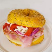 Italian Combo Sandwich  · Ham, salami, provolone, roasted red peppers, red onions, mayo, oil and vinegar 