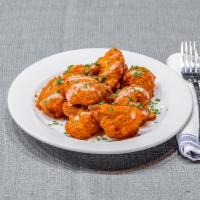 Buffalo Cauliflower · Served with Blue Cheese Dressing.