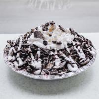Oreo Yogurt Pie · Cookies 'n Cream yogurt with an Oreo cookie crust.  Topped with crushed Oreo cookies and dri...