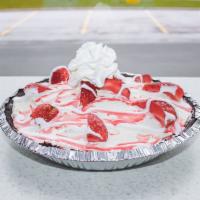 Strawberry Cheesecake Frozen Yogurt Pie · Graham Pie Crust, filled with delicious Strawberry Cheesecake frozen yogurt and topped with ...