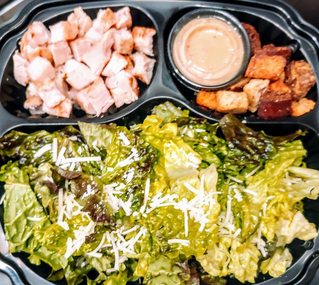Chicken Caesar Salad · Grilled chicken, romaine lettuce, Parmesan cheese, and croutons.