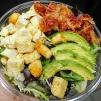 House Salad · Lettuce, tomato, onions, peppers, croutons, and cucumber.