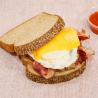 18. Meat, Egg and Cheese Breakfast Sandwich · Beef bacon, turkey bacon or beef sausage.