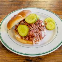 Brisket Sandwich · Slaw and Hawaiian roll.