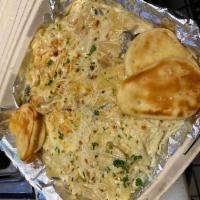 Alfredo Chicken Pasta · Angel hair pasta with chicken mushroom home Alfredo sauce topped with mozzarella and Parmesa...