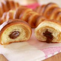 Chocolate Croissant · Buttery flaky croissant filled with decadent chocolate.