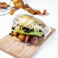 Arepa Pabellon · Black beans, avocado, cheese, sweet plantain and corn. Add steak for an additional charge.
